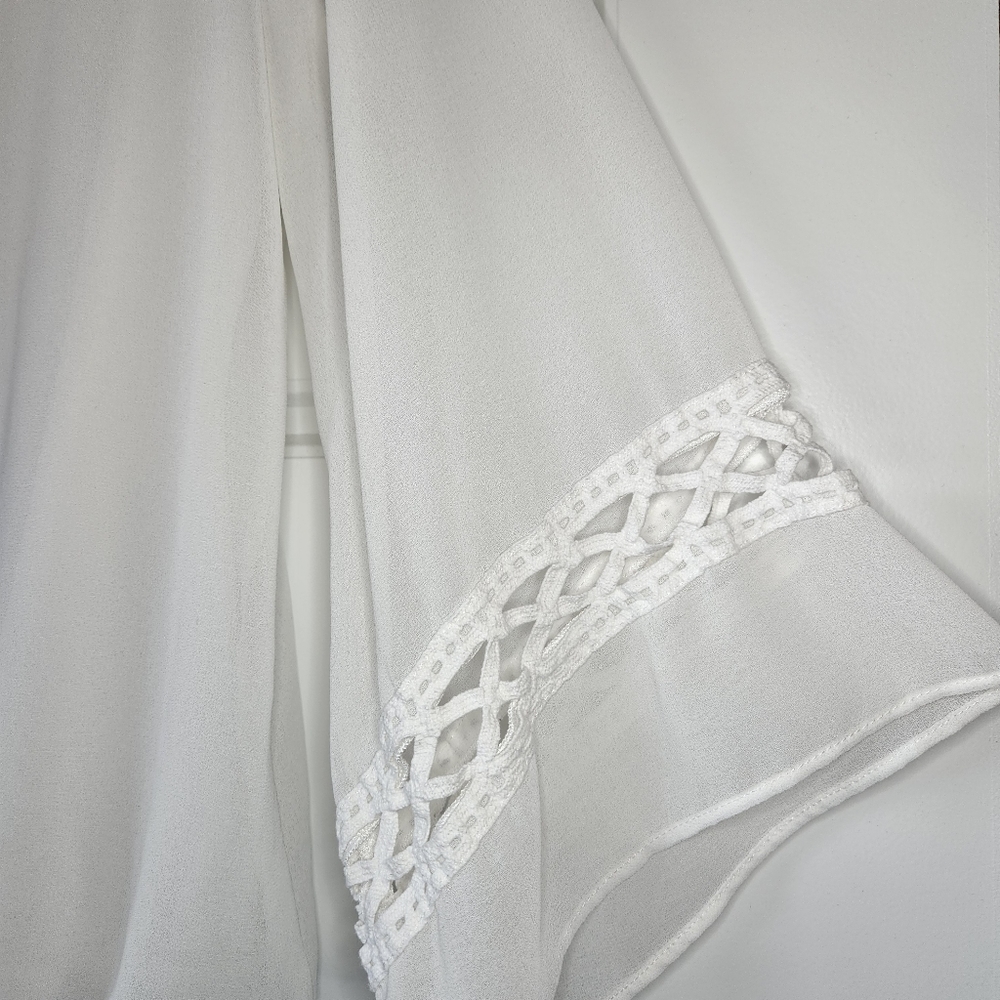 Flowing White Top with flare sleeves and a mid rise waist - Picture 5 of 5